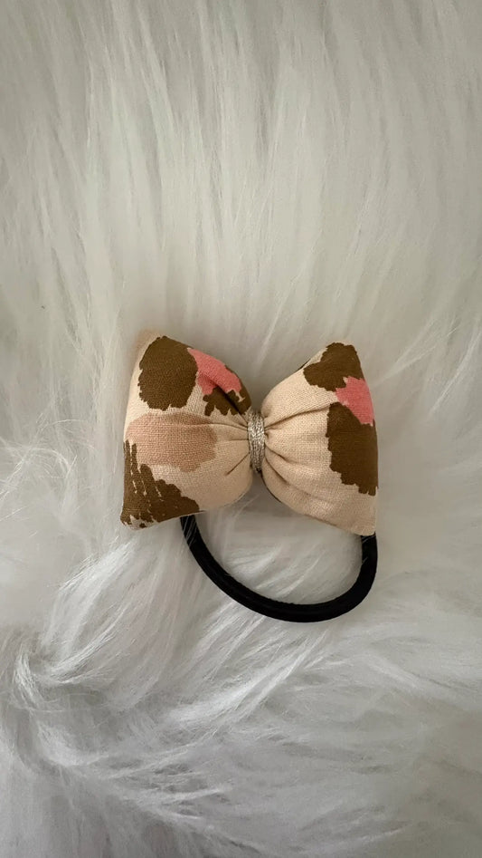 Chouchou noeud pour cheveux à motifs léopard écru liserai argent