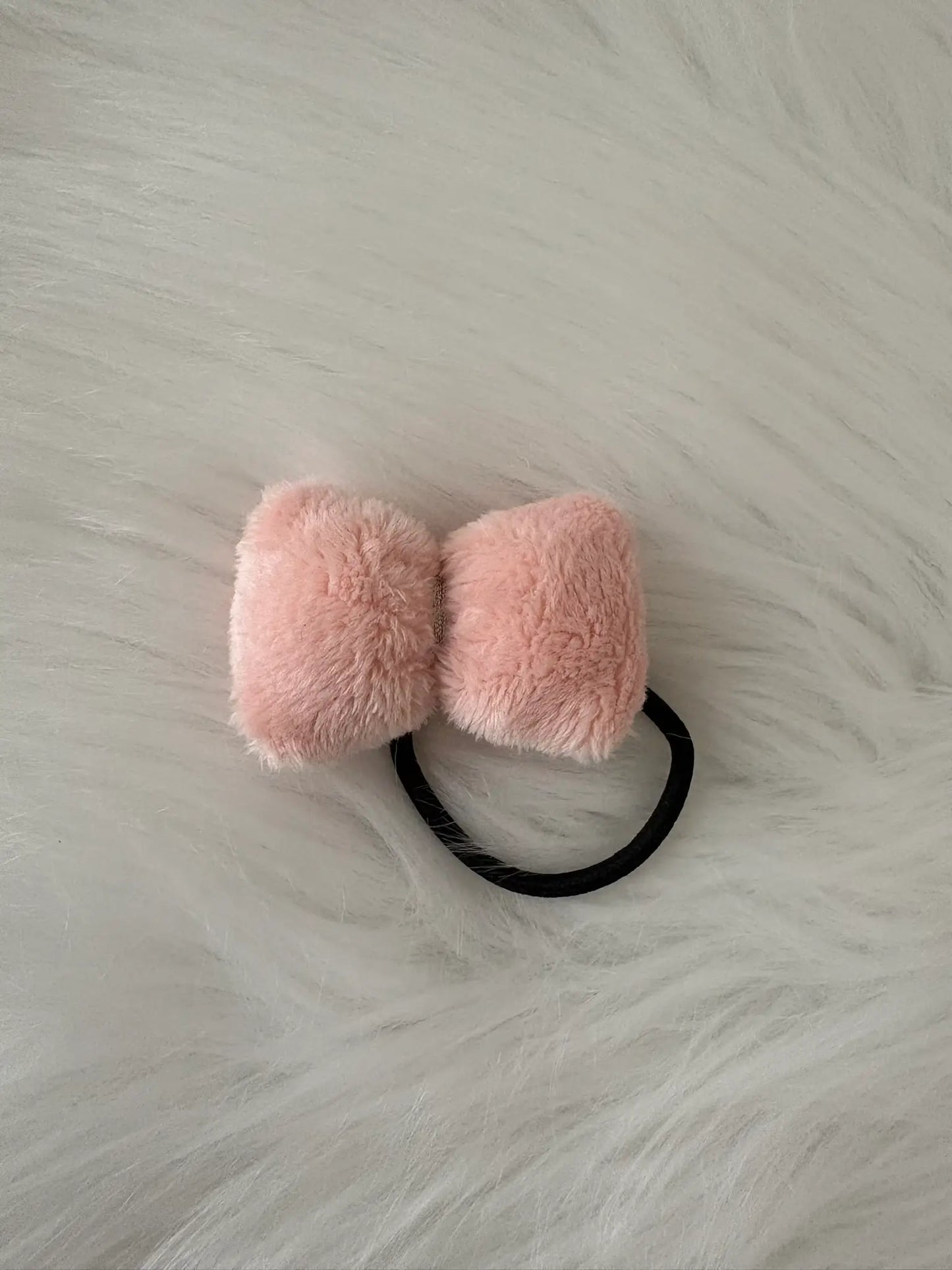 Chouchou noeud pour cheveux en polaire rose avec liserai doré