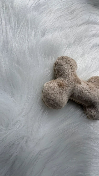 Jouet pour chien en forme d'os, fait main, avec ou sans pouet-pouet, couleur beige, en polaire certifiée OekoTex Standard 100 vue de côté